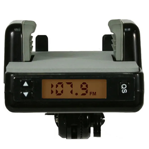 FM transmitter car adapter mounted in car with phone held in stand