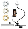 Compact 8cm LED ring light shown on desk stand
